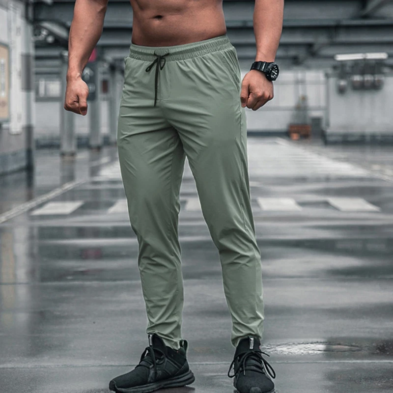 Jogger Sweatpants Men - ผู้ชายกางเกงกีฬาพร้อมกระเป๋าวิ่งออกกําลังกายกางเกง Quick DRY Jogger Sweatpants คุณภาพสูงฟิตเนส